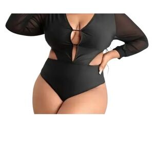 Elegant Black Sheer Sleeve Bodysuit Class is a Lost Art